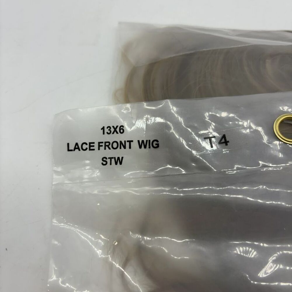 Unknown Blonde Wavy Wig
